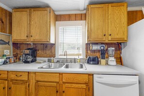 Fridge, microwave, oven, stovetop - Downtown Folly Beach home with free WiFi, washer/dryer, smart TV, & more (Folly Beach)