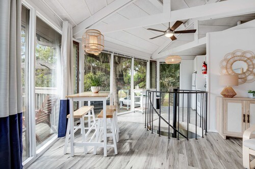 Lakefront home with lagoon view, deck & AC - close to beach, golf, & pools