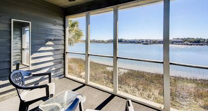 2-story riverfront condo with 2 balconies, outdoor pool, grills, river views, AC