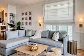 TV, offices - Stylish Oceanview Condo: Pool, Parking & Prime Location! (Folly Beach)