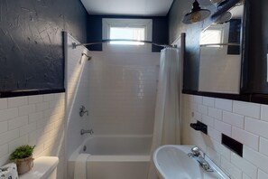 Shower, hair dryer, towels, shampoo