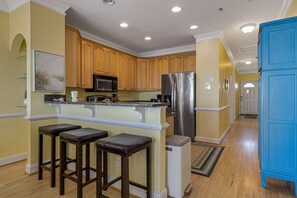 Fridge, microwave, oven, stovetop - Third-floor condo with views of the ocean & shared pool (Folly Beach)