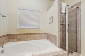 Shower, hair dryer, towels, shampoo