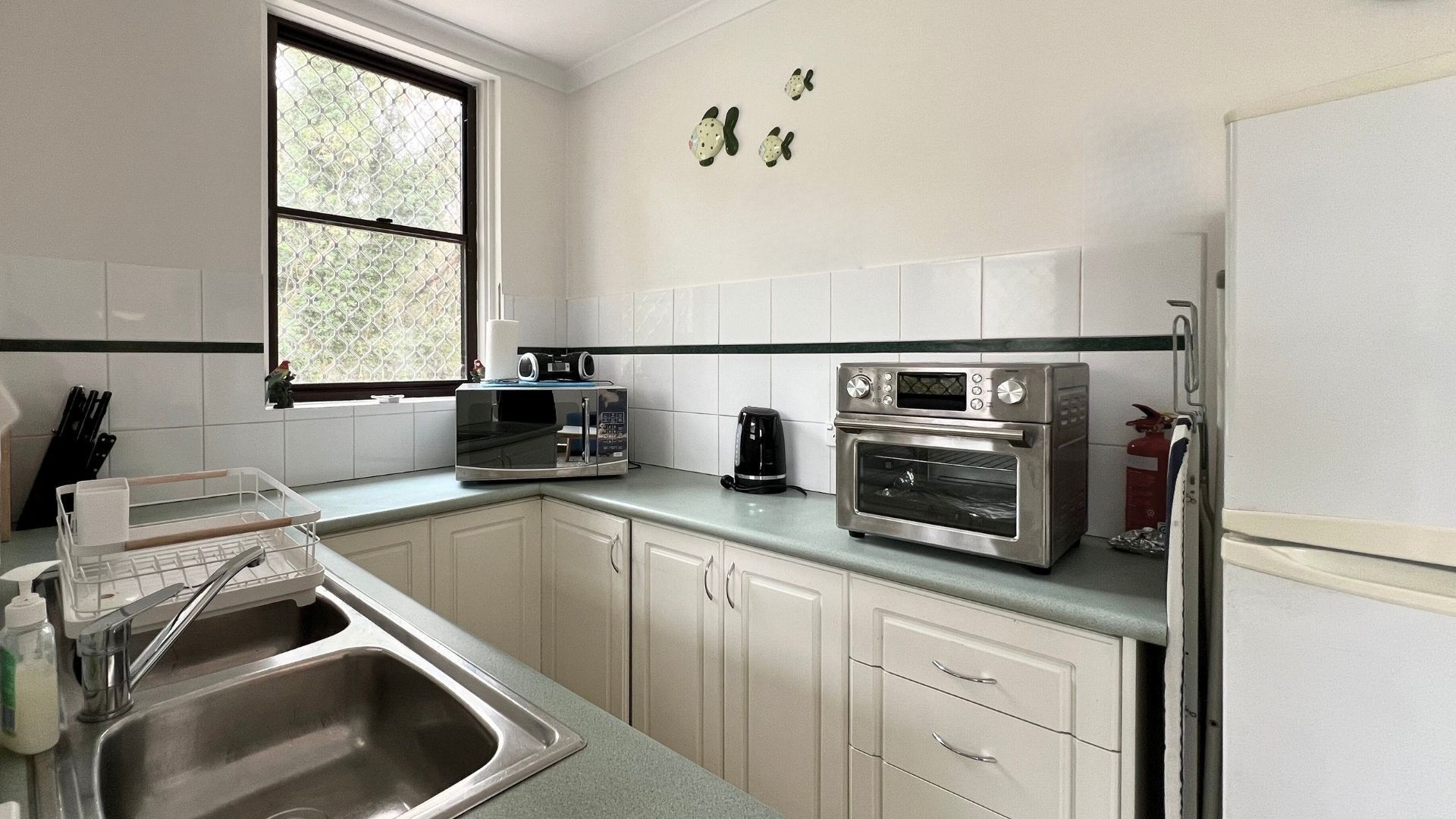 Fridge, microwave, dining tables