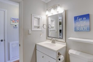Shower, hair dryer, towels, shampoo