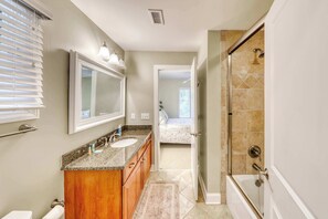 Shower, hair dryer, towels, shampoo