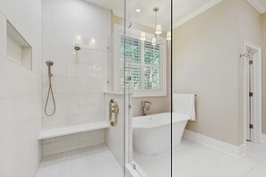 Shower, hair dryer, towels, shampoo