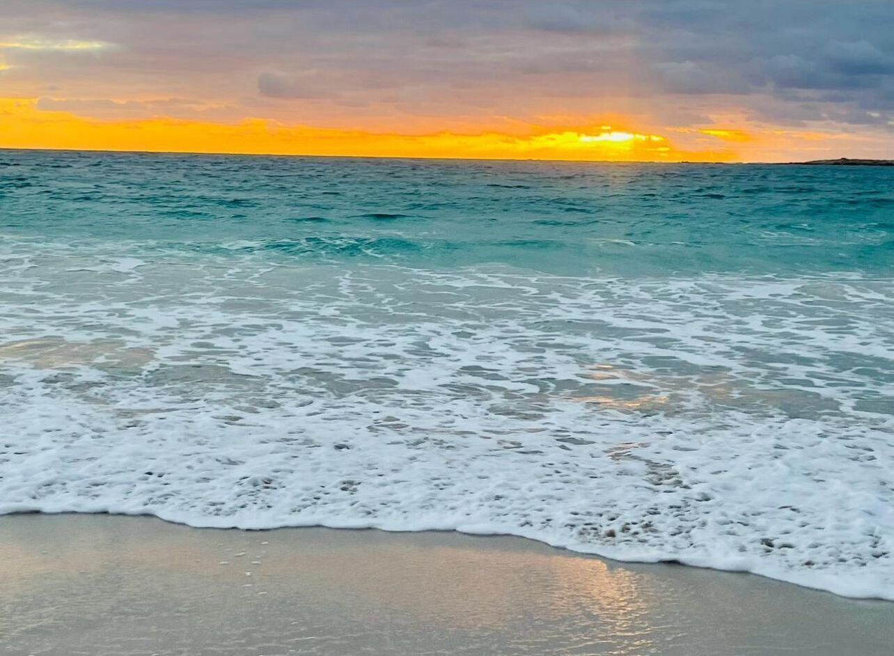 On the beach, sun-loungers, beach towels