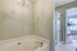Shower, hair dryer, towels, shampoo