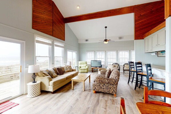 TV, offices - Oceanfront home with WiFi, full kitchen, & deck that spans the side of the home (Folly Beach)