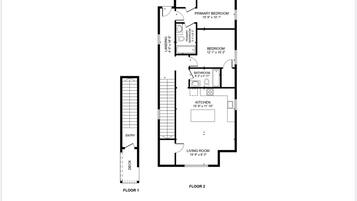A floor plan of a two-story house with a landing area, a primary bedroom, a secondary bedroom, a bathroom, a kitchen, a living room, and a deck.