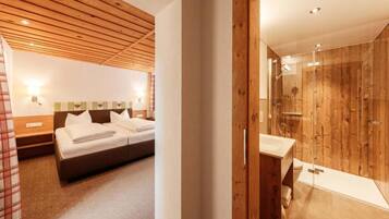 Family Room, Balcony, Mountain View | Bathroom | Shower, hair dryer, towels, soap