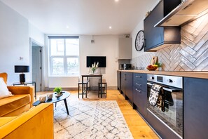 Apartment | Private kitchen | Full-size fridge, microwave, oven, stovetop