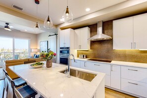 Fridge, microwave, oven, stovetop - Brand new condo steps to beach with balcony heated pool and hot tub dog friendly (Madeira Beach)