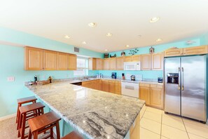 Fridge, microwave, oven, stovetop - Oceanfront condo with WiFi pool and views walk to dining and attractions (Indian Rocks Beach)