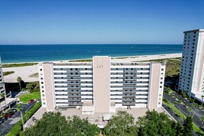 Exterior - Second-floor condo with pool and tennis court, private W/D, and central AC (Clearwater)