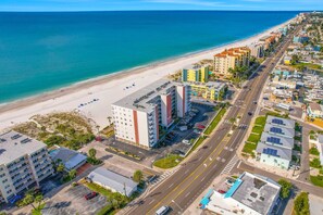 Exterior - Upscale beachfront condo with dual balconies Gulf view pool hot tub and bocce (Madeira Beach)