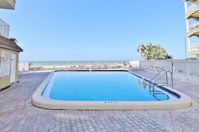 Spacious beachfront condo with lovely Gulf views, balcony, heated pool & AC