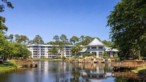A resort with a large body of water, wooden walkways, and multiple buildings with balconies. - Marriott's SurfWatch Resort (Hilton Head Island)