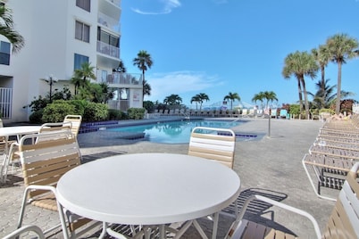 4th-floor beachfront corner condo with private balcony, views, heated pool, BBQ,