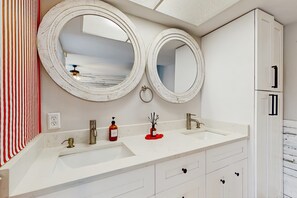 Shower, hair dryer, towels, shampoo