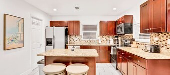 Dog friendly tropical stay with a private pool grill game tables and central AC