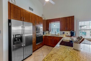 Fridge, microwave, oven, stovetop - Spacious and family friendly with pool, dock, and just steps to the beaches (Indian Shores)
