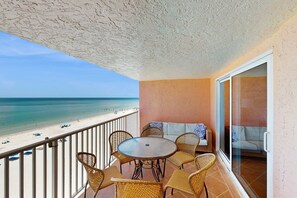 Outdoor dining - Dreamy condo with panoramic Gulf vIews and beachfront heated pool and spa (Indian Shores)