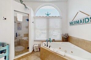 Shower, hair dryer, towels, shampoo