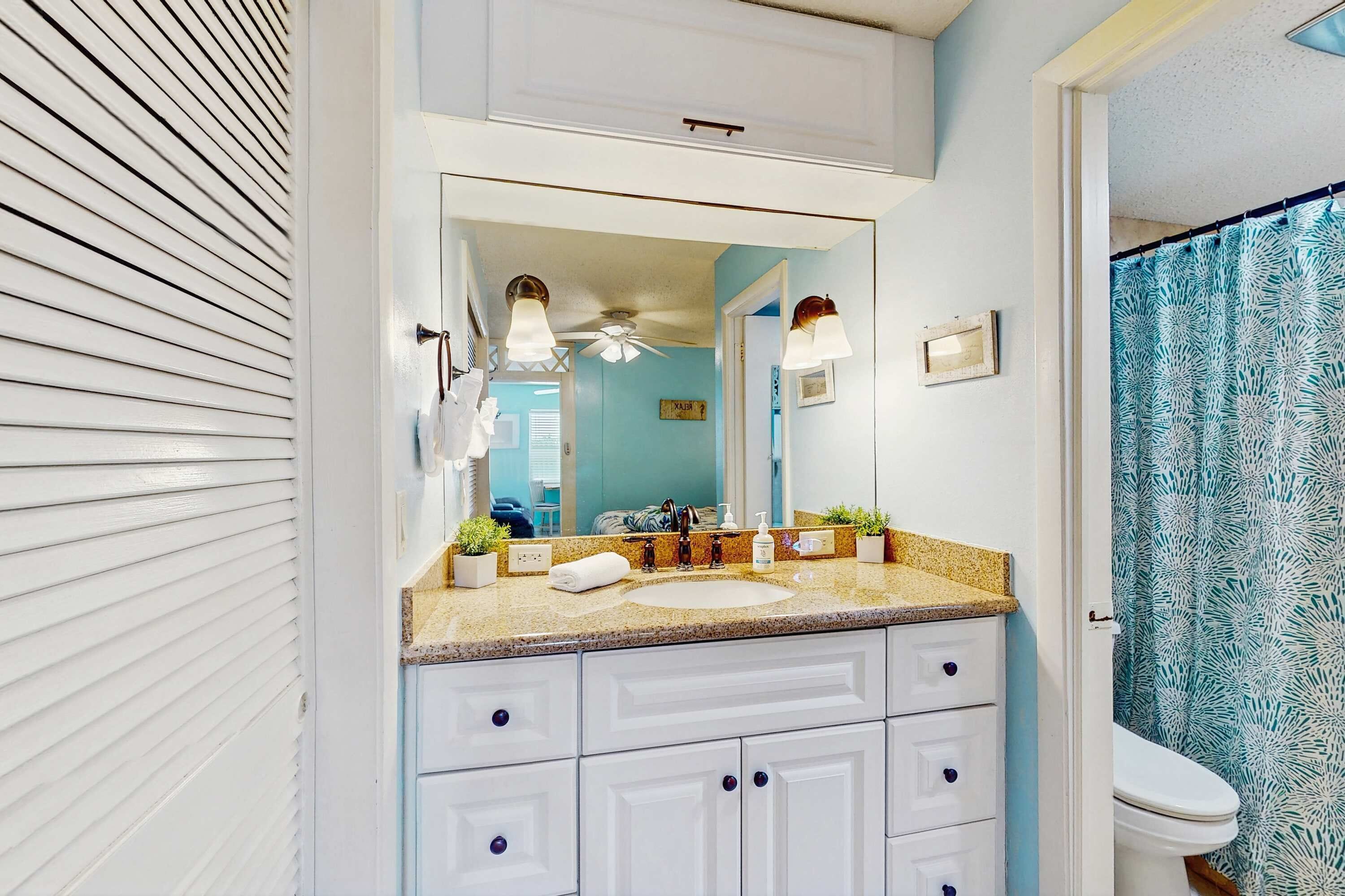 Shower, hair dryer, towels, shampoo