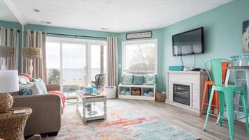 Smart TV, fireplace, books