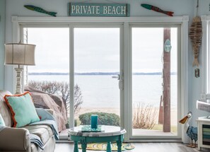 Smart TV, fireplace, books - Coastal Serenity 108 Beachfront Condo Near Downtown (Traverse City)