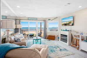 Smart TV, fireplace, books