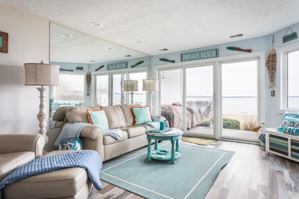 Smart TV, fireplace, books - Coastal Serenity 108 Beachfront Condo Near Downtown (Traverse City)