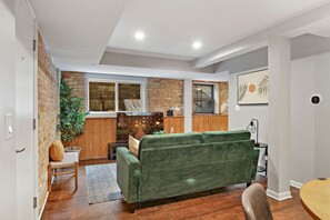 Superior Apartment, 2 Bedrooms | Living area | 55-inch TV with digital channels, streaming services