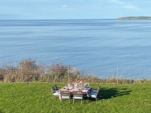Outdoor dining - Whitewater, with expansive sea views and hot tub (Westward Ho!)