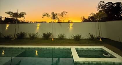 Single-story house with pool in a complete resort.