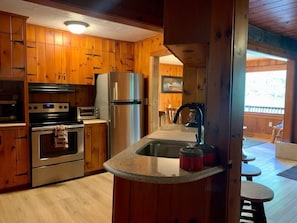 Fridge, microwave, toaster, cookware/dishes/utensils