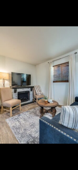TV, fireplace - Prime Central Location Minutes from TMC Hospital: Desert Guest House (Tucson)