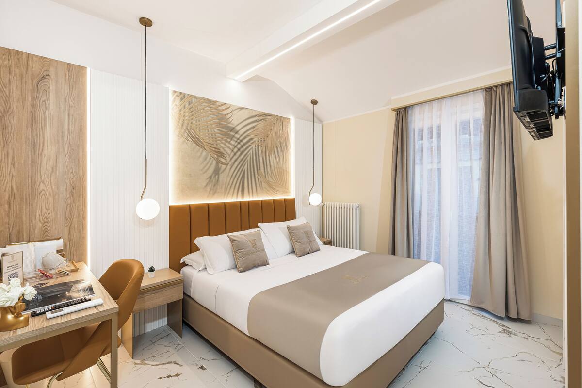 Double Room, Balcony, Courtyard View | In-room safe, blackout drapes, soundproofing, iron/ironing board