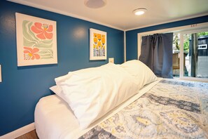 Iron/ironing board, travel crib, free WiFi, bed sheets