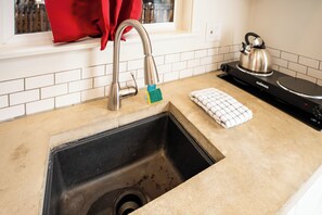 Fridge, stovetop, coffee/tea maker, electric kettle