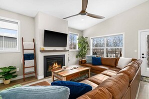 Smart TV, fireplace, books