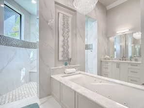 Shower, jetted tub, hair dryer, towels