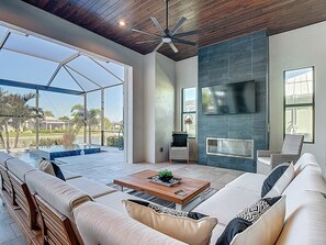 Smart TV, fireplace, books