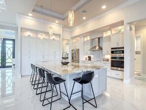 Fridge, microwave, oven, stovetop - Luxury, Heated Pool & Spa, Outdoor Kitchen, Kayaks, Gulf Access: Sun Seeker's Horizon (Cape Coral)