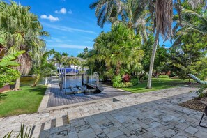 A heated pool - Elegant Naples Escape | Waterfront Luxury Meets Tropical Tranquility (Naples)