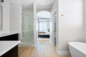 Shower, hair dryer, towels, shampoo