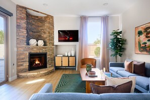 Smart TV, fireplace, books