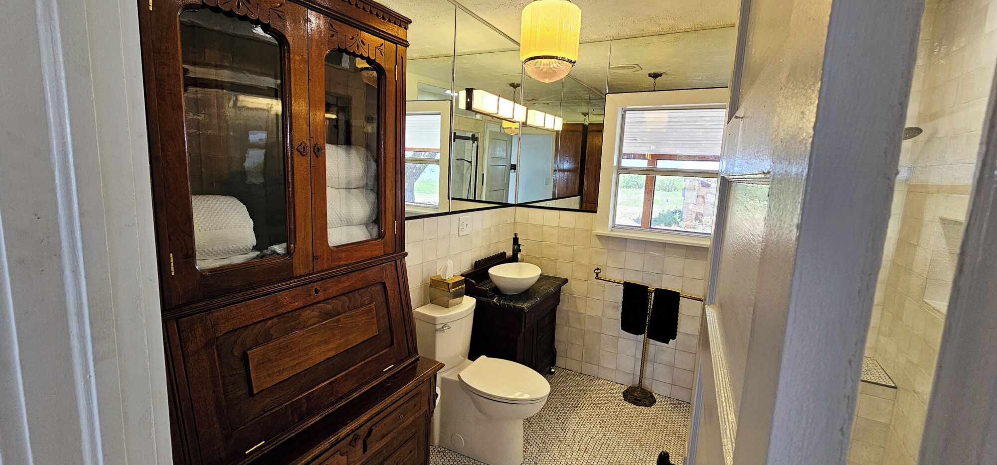 Shower, towels, soap, toilet paper